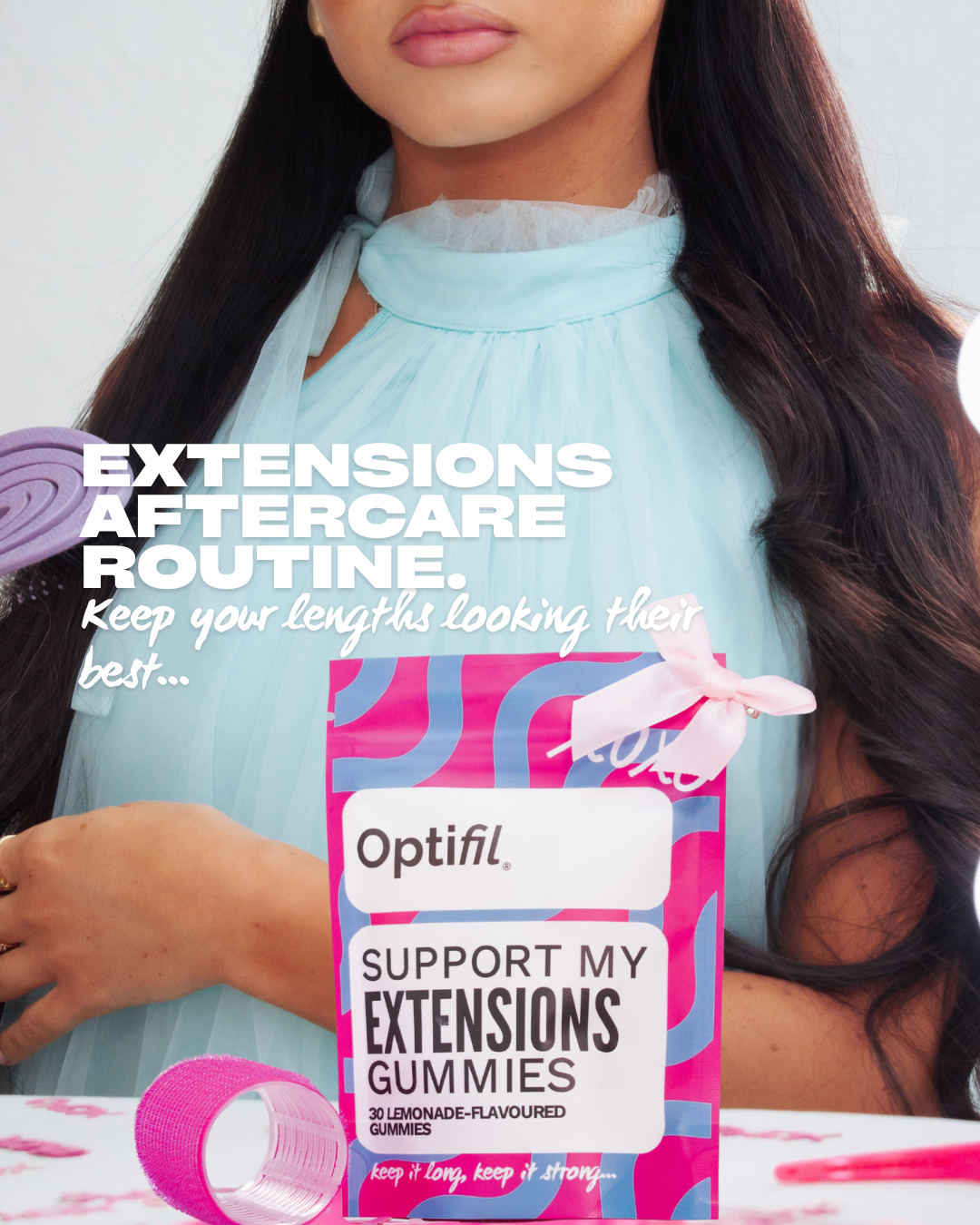 Model Brushing long hair with Optifil Support My Extensions Gummies in front of her