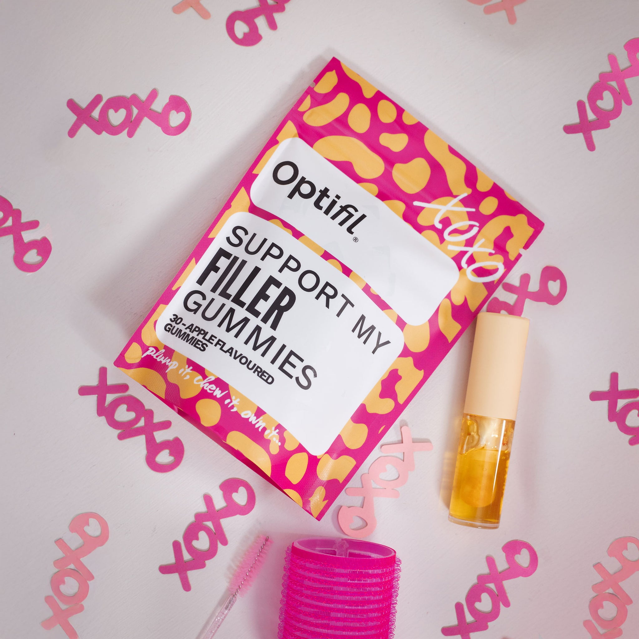 Optifil Support My Filler Gummies packaging with a pink background featuring 'xoxo' text.